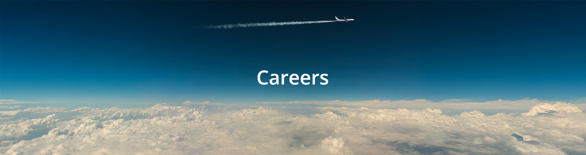 plane with jet stream flying above the clouds
